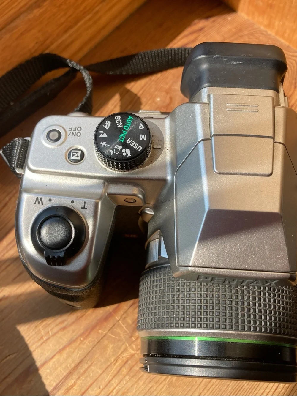 Pentax Black and Silver SLR Camera Body with Pentax Lens Cap
